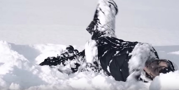 Snow clings to clothes and adds texture and sound to the body in motion; screenshot from 1/6.